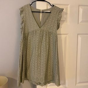 Sage green eyelet romper. Size medium.